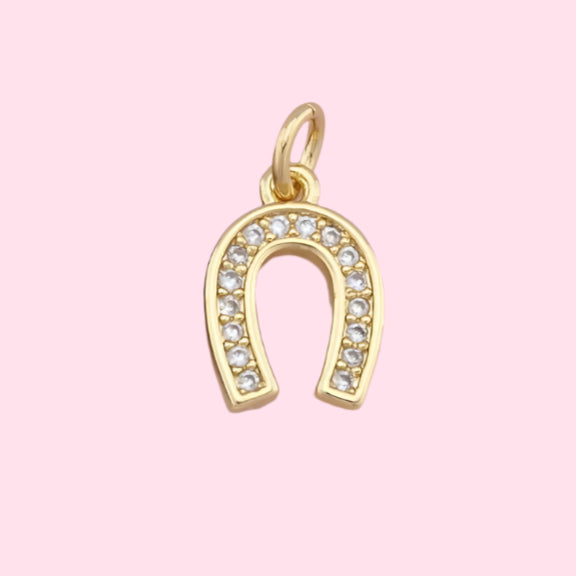 gold horseshoe charm