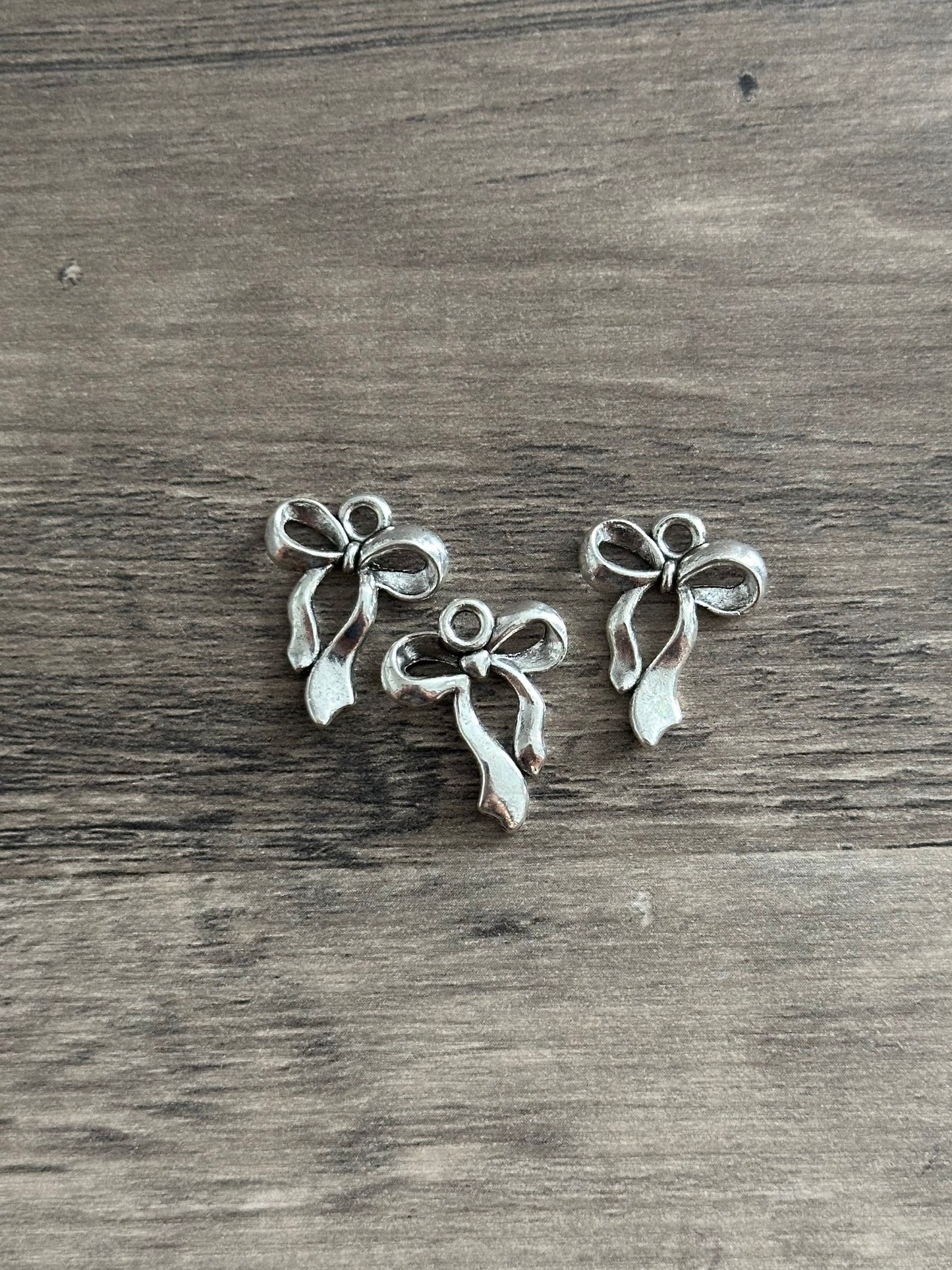 silver bow charm