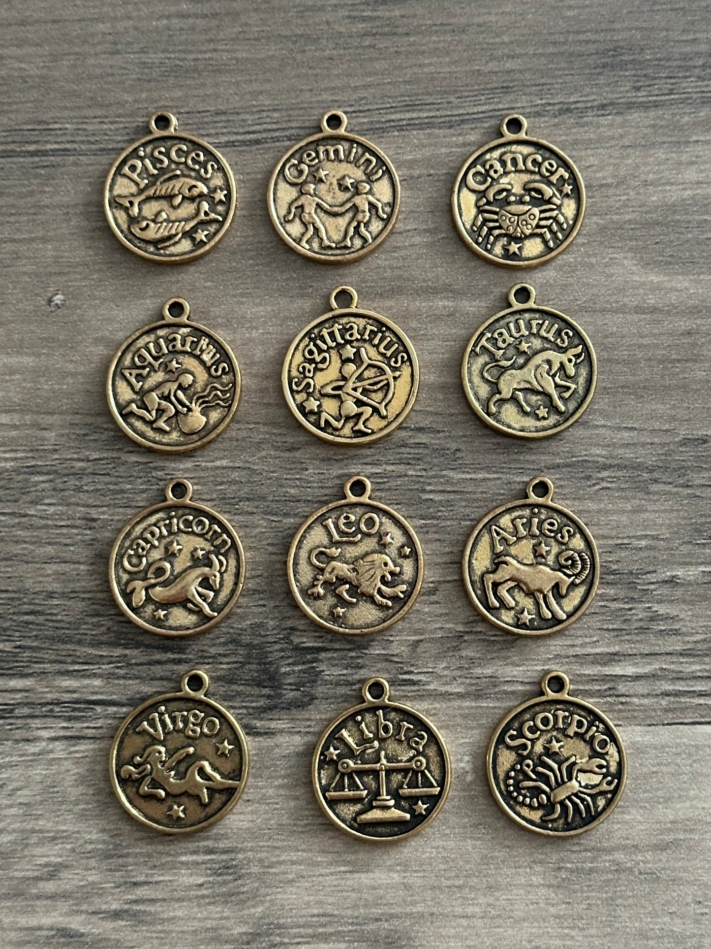 gold zodiac charm